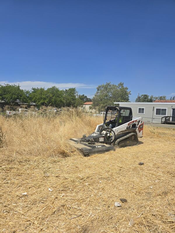 bulldozing dangerous dry grass